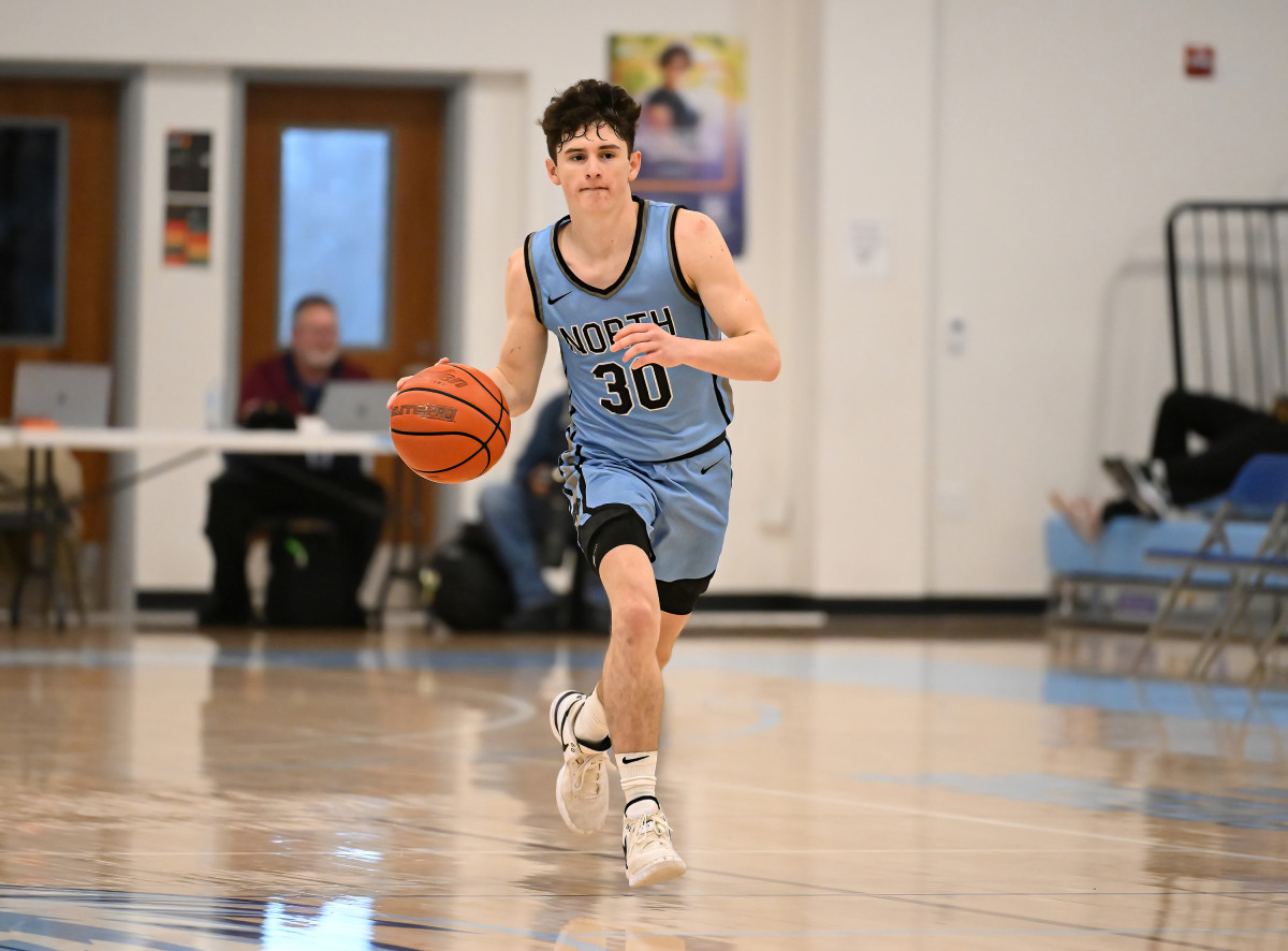 Clovis West's Connor Amundsen dribbles across half court during a win over Vanden on January 20, 2024